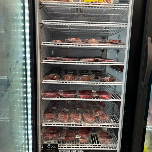 Inside Hamilton Farm & Ranches convenience meat fridge overview